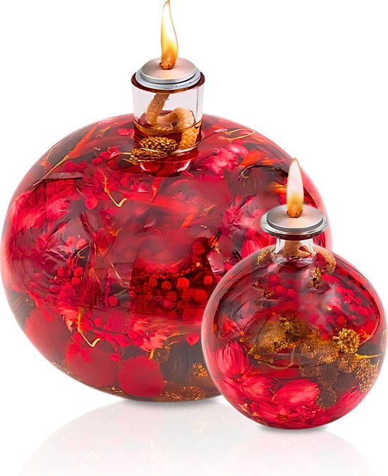 Glass oil lamp with dried red flower decor, detail view