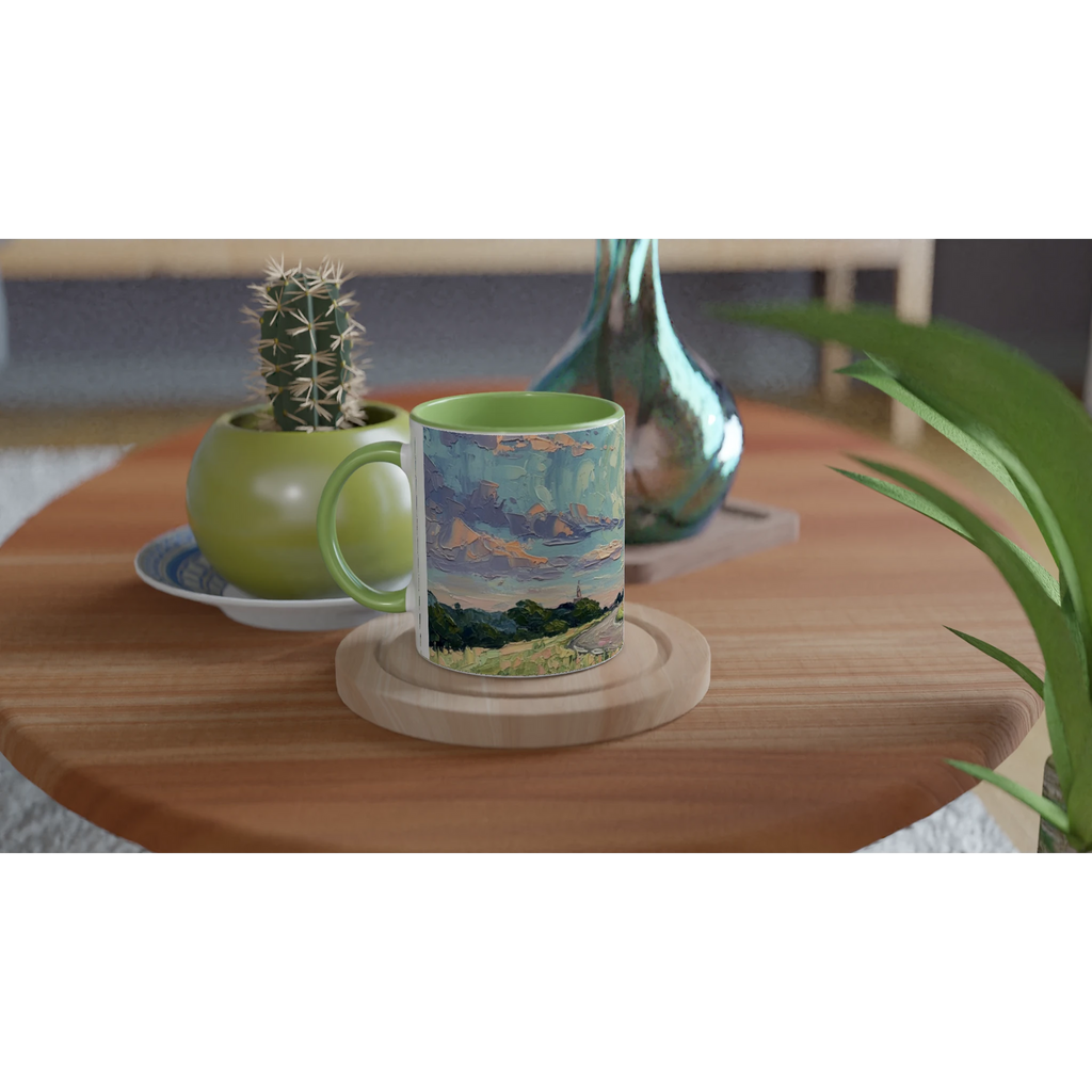 'MOON ON TOUR' white ceramic mug with color inside on a table